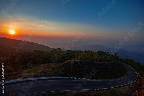 Doi Inthanon with the mist on the morning sun. Scenic view of Doi Inthanon National Park in Chom  Thong District Chiang Mai Province, Northern Thailand. The roof of Thailand.