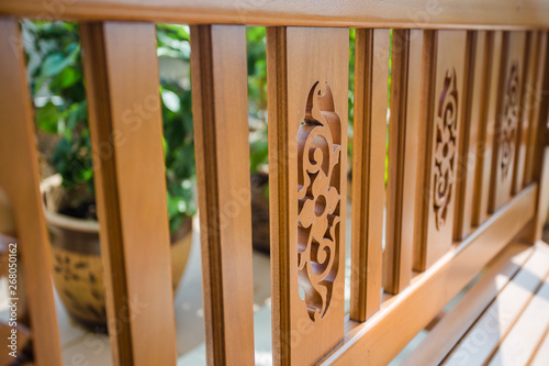 Fence made out of woods and engraved