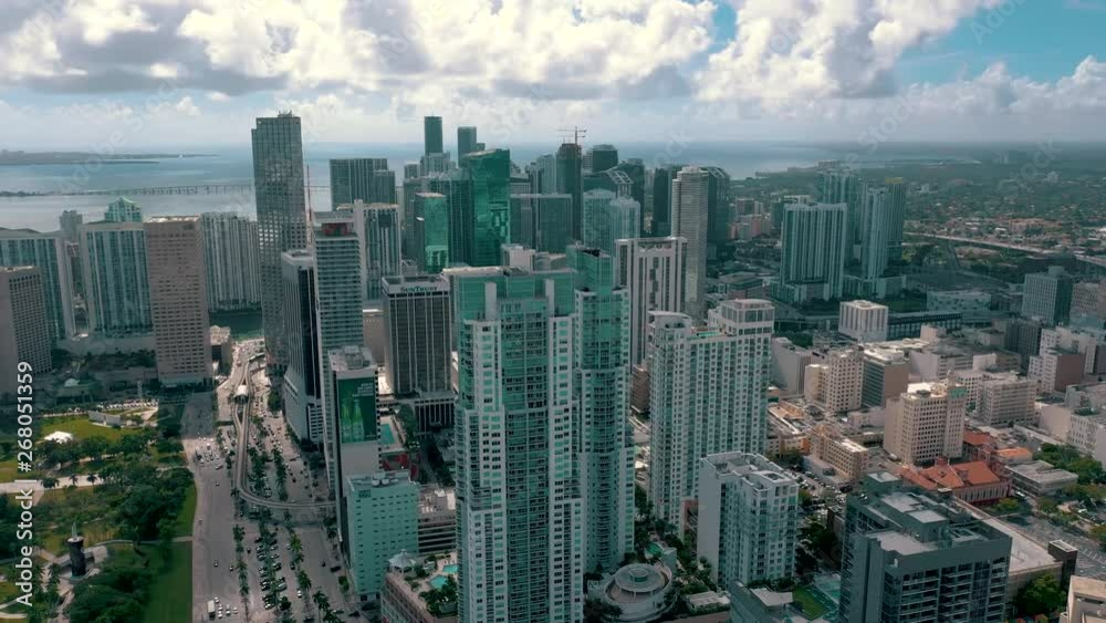 MIAMI, FLORIDA, USA - MAY 2019: Aerial drone view flight over Miami downtown. Hotels, business buildings from above. MIAMI, FLORIDA, USA - MAY 2019: Aerial drone view flight over Miami downtown. Hotels, business buildings from above.