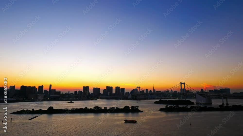 Beautiful Colorful Cinematic Sunset and Night Timelapse of Rainbow Bridge Skyscrapers and Boats in Tokyo Bay Japan 4k Beautiful Colorful Cinematic Sunset and Night Timelapse of Rainbow Bridge Skyscrapers and Boats in Tokyo Bay Japan 4k