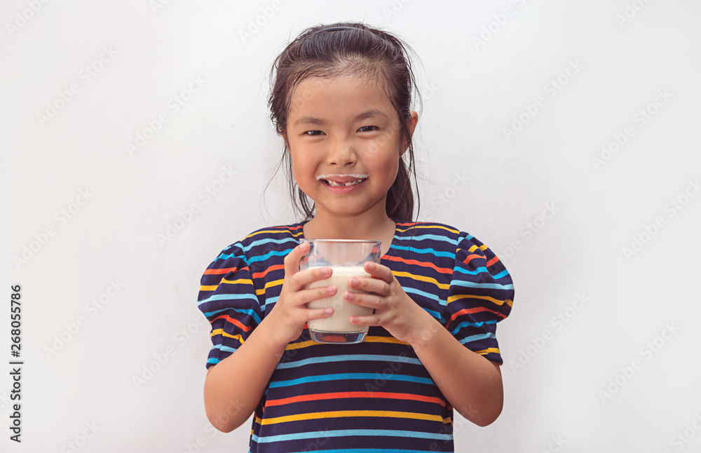 Cute little girl with glass of milk Cute little girl with glass of milk