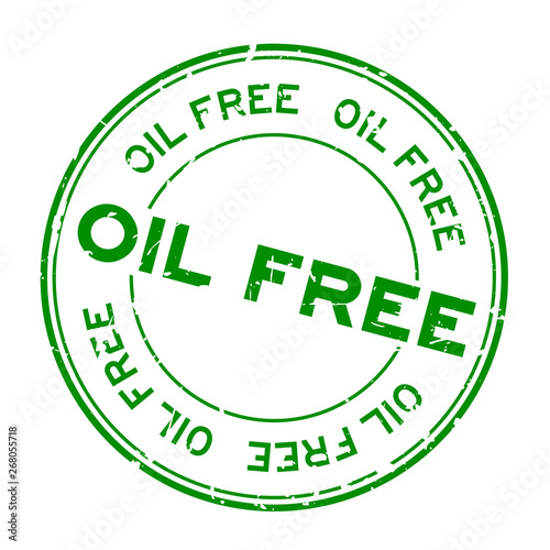 Grunge green oil free word round rubber seal stamp on white background