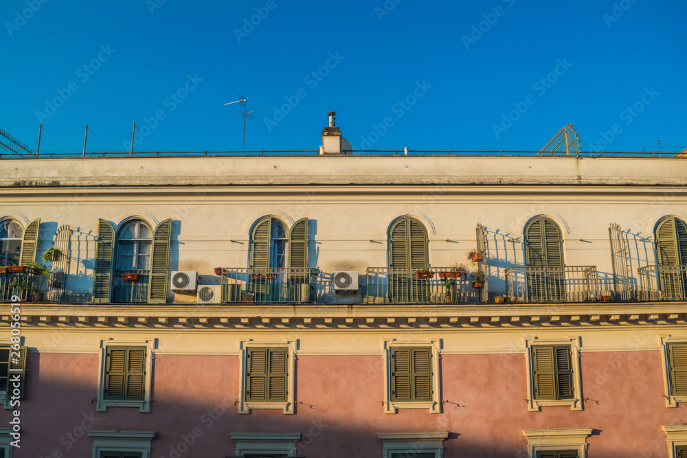 Facade of a typical apartment in the city of Rome - Italy