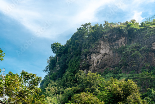 High Cliff Amid Dense and Thick Forest. Hanging Wall Rock Cause by Tectonic Subduction At Geopark Ciletuh.