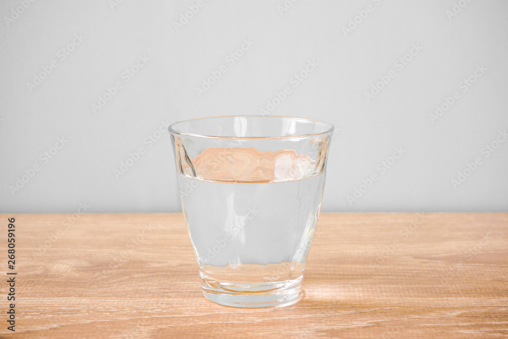 Glass of water on the table. テーブルの上のグラス一杯の水 Glass of water on the table. テーブルの上のグラス一杯の水