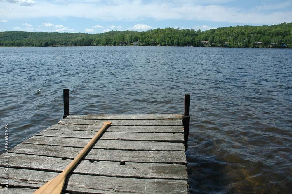 Solitude - cedar dock on a small calm lake