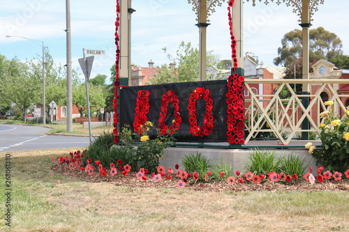 The band rotunda at Creswick decorated with hand made paper and knitted red poppies to mark the 100th anniversary of the Armistice of World War I photo