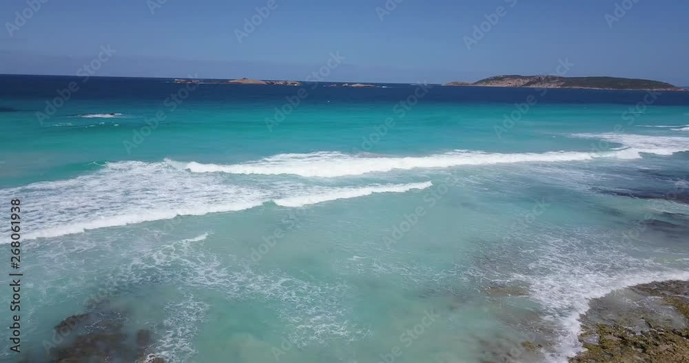 Gentle rhythm of waves on quiet Australian coastline (aerial view) Gentle rhythm of waves on quiet Australian coastline (aerial view)