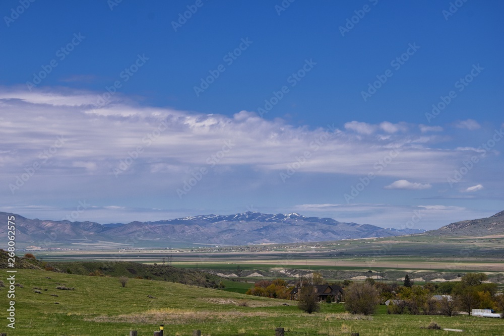 Tremonton and Logan Valley landscape views from Highway 30 pass, including Fielding, Beaverdam, Riverside and Collinston towns, by Utah State University, in Cache County along the Wasatch Front Range 