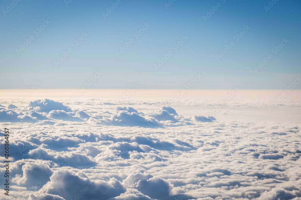 blue sky with tiny clouds