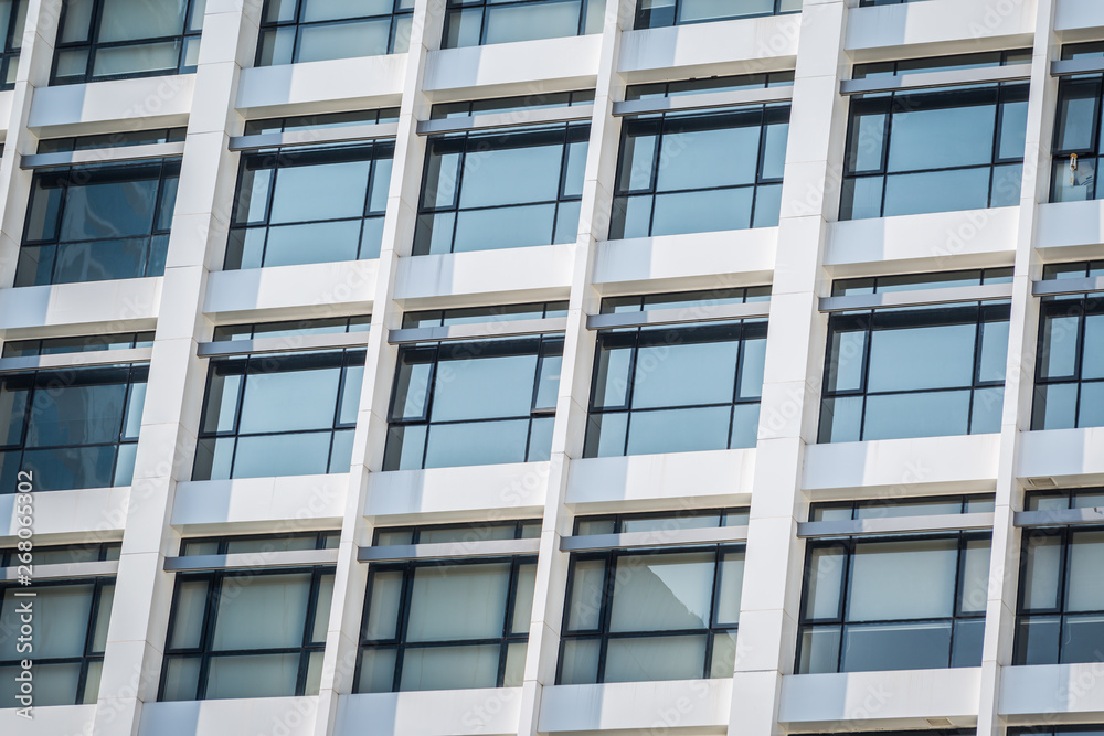 Windows of white building Windows of white building