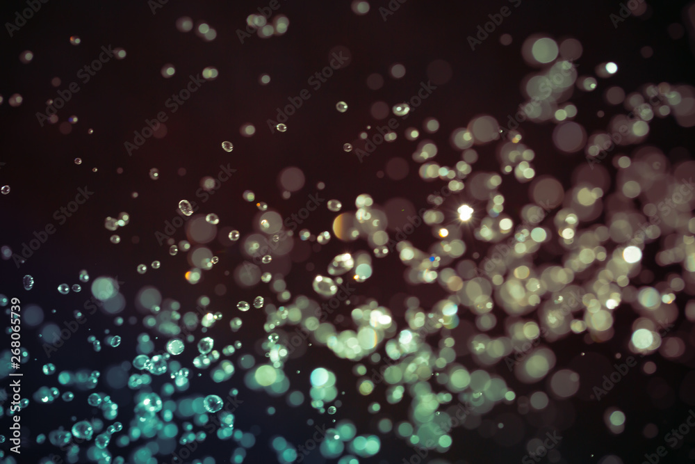 Abstract bokeh texture on black background Abstract bokeh texture on black background