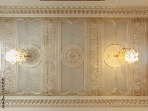 Fototapeta Naklejka Na Ścianę i Meble -  Ceiling with chandeliers of Banquet hall. A building in classical style