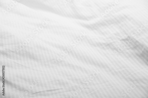 Fototapeta Naklejka Na Ścianę i Meble -  White delicate soft background of fabric or bedding sheet