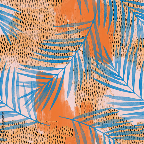 Water color palm leaves on rough grunge textures, doodles, scribbles background