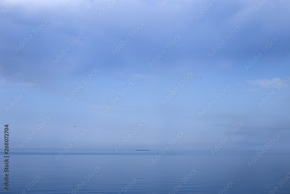 summer landscape of a large river and sky, as a screensaver or background, serenity. summer landscape of a large river and sky, as a screensaver or background, serenity.