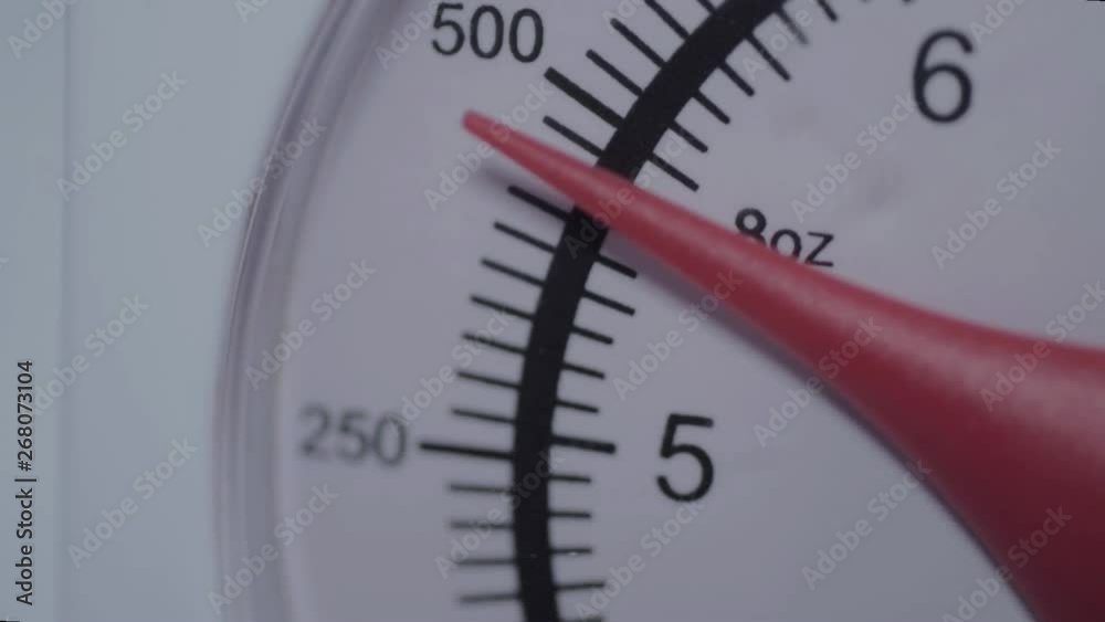 Kitchen weighing scales with moving dial Kitchen weighing scales with moving dial
