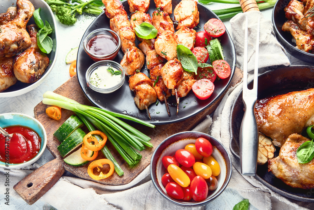 Grilled chicken meat meals on table. Top view Grilled chicken meat meals on table. Top view