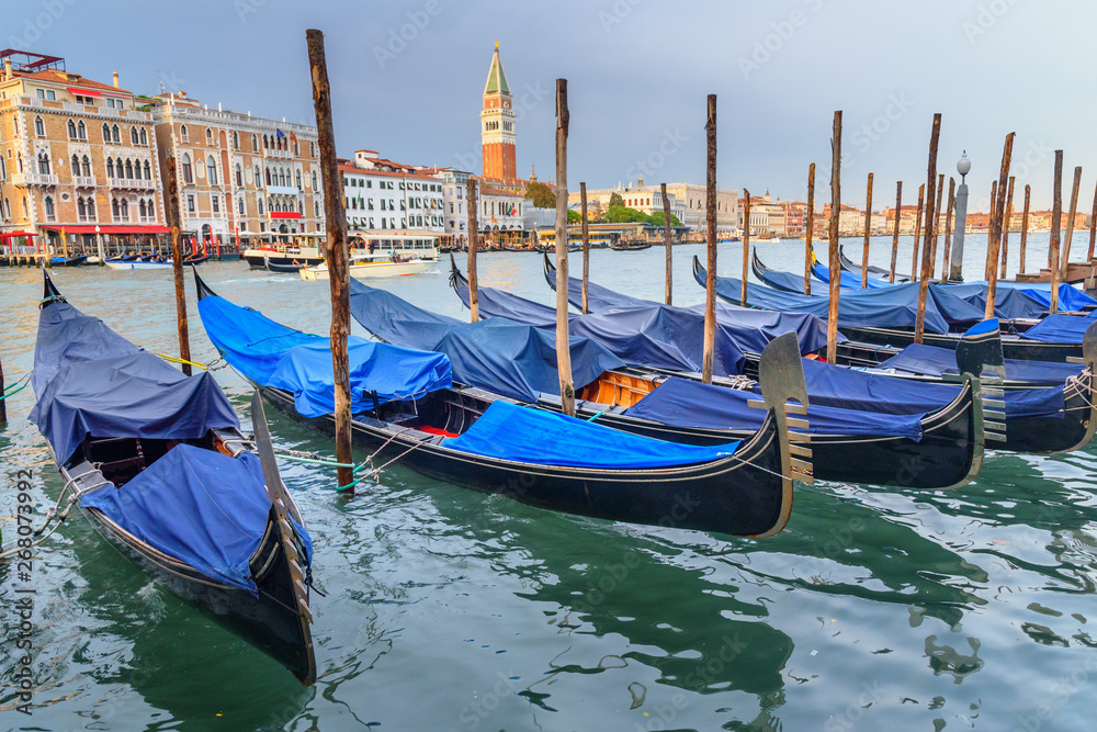 Gondolas moored by Fondamenta Salute. Venice. Italy