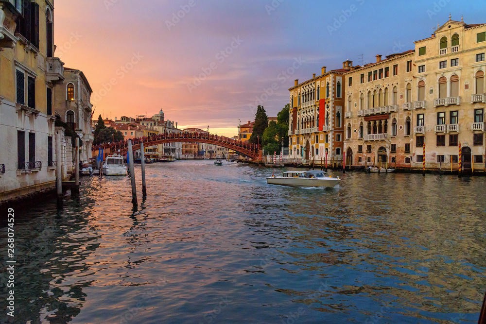 Bridge Ponte dell'Accademia over Grand Canal on sunset. Venice. Italy