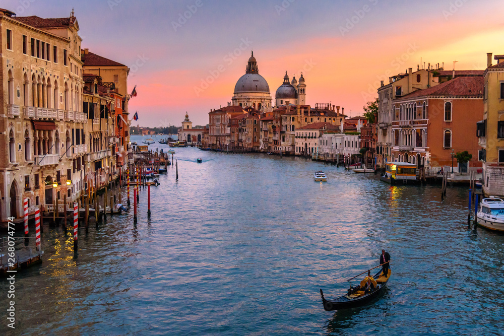 View of Grand Canal from Bridge Ponte dell'Accademia on sunset. Venice. Italy