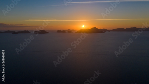 Sunset over the sea with the islands. Seascape with sunset aerial view © Tatiana Nurieva