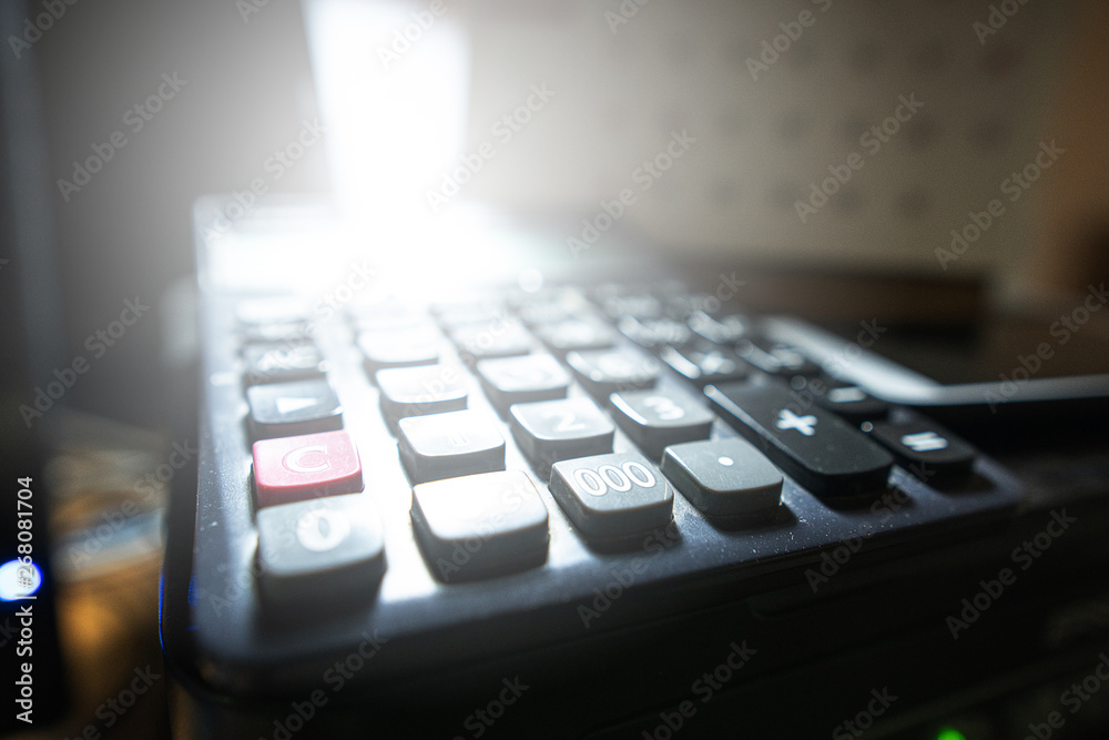 Business accounting concept, Business woman using calculator with computer laptop, budget and loan paper in office Business accounting concept, Business woman using calculator with computer laptop, budget and loan paper in office