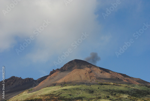volcano mountain with smoking peak