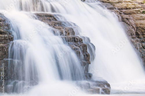 The small waterfall with a rocks.