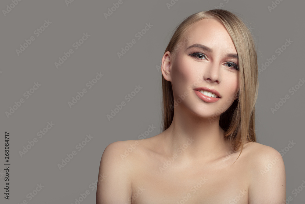 woman with a beautiful smile and blond hair. Cystic skin concept woman with a beautiful smile and blond hair. Cystic skin concept