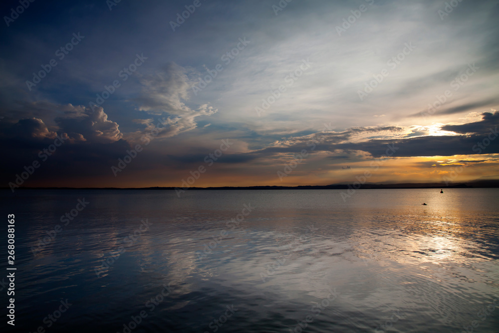 Naklejka premium Lake Garda in sunset