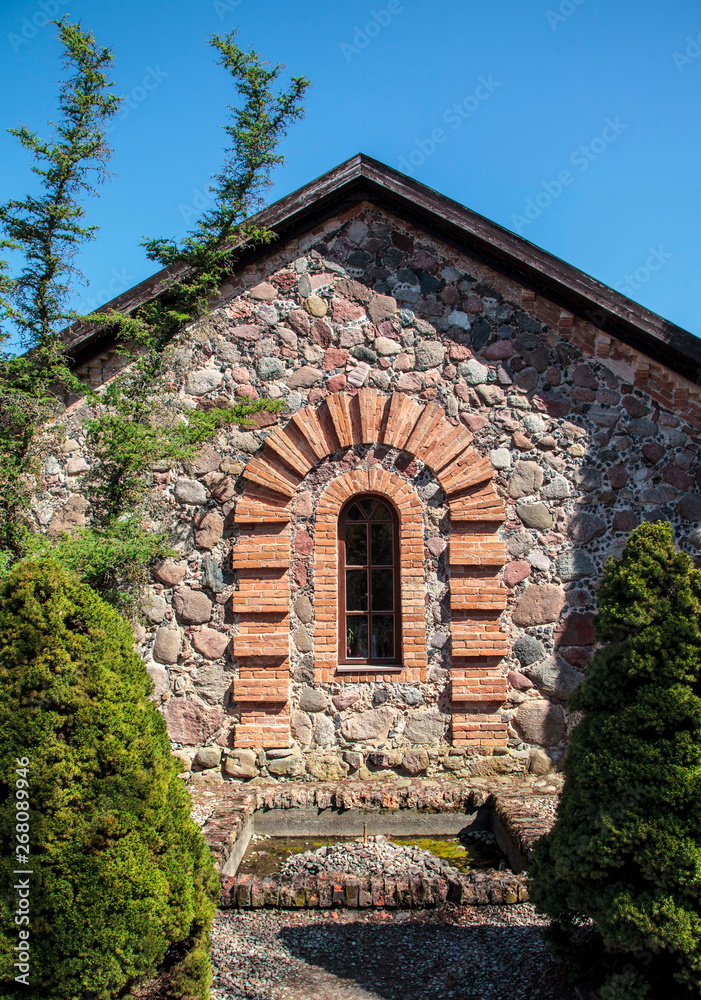 Fototapeta premium Fragment of stones building in Kairenai