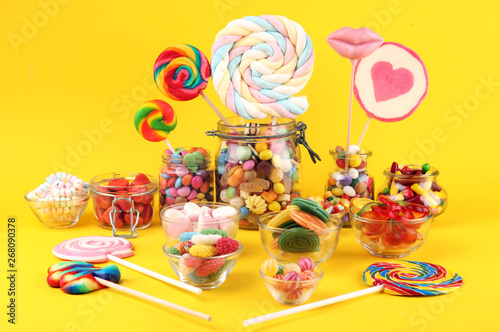 candies with jelly and sugar. colorful array of different childs sweets and treats.