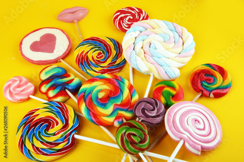 lolly candies with sugar. colorful array of childs lollipops sweets and treats with candy