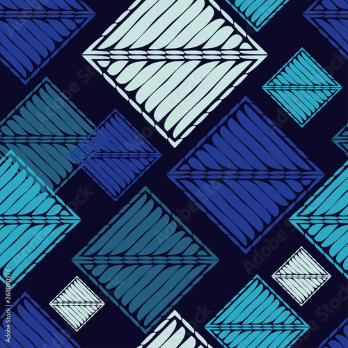 Ethnic boho seamless pattern. Embroidery on fabric. Patchwork texture. Weaving. Traditional ornament. Tribal pattern. Folk motif. Can be used for wallpaper, textile, invitation card, wrapping, web.