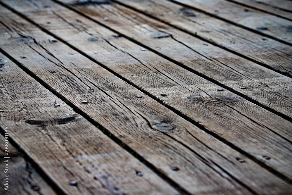 Obraz premium Stare klimatyczne deski z sękami i gwoździami