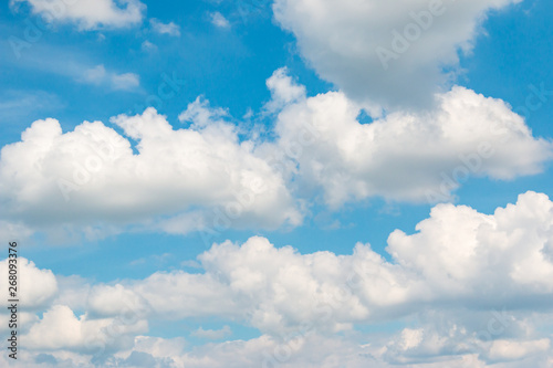 white clouds against blue sky as background