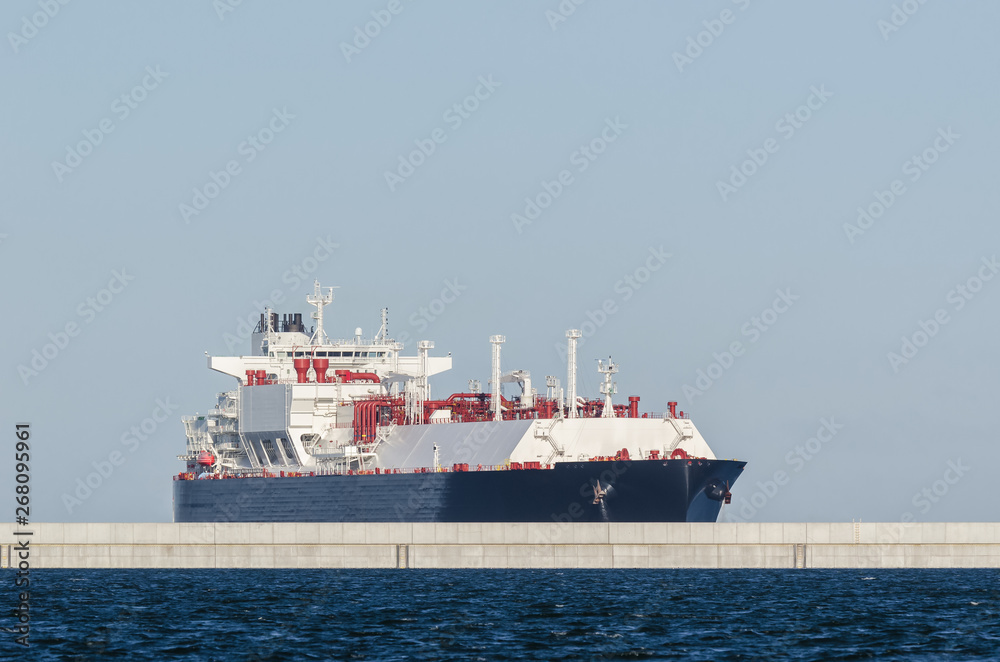 GAS CARRIER - A tanker with a natural gas cargo flows to the sea port