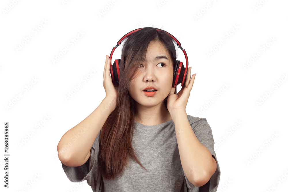 young woman wearing headset enjoying new audio tracks playing in young woman wearing headset enjoying new audio tracks playing in