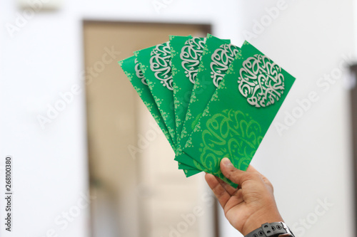 Money packet as Hari Raya gift for Ramadan and Eid Fitr Celebration. "Salam or Selamat Aidilfitri" text in Arabic and Malay translated in English as "Eid al-Fitr"
