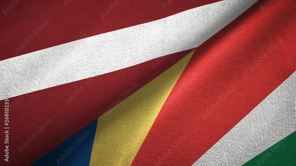 Fototapeta premium Latvia and Seychelles two flags textile cloth, fabric texture