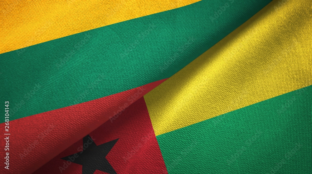 Fototapeta premium Lithuania and Guinea-Bissau two flags textile cloth, fabric texture