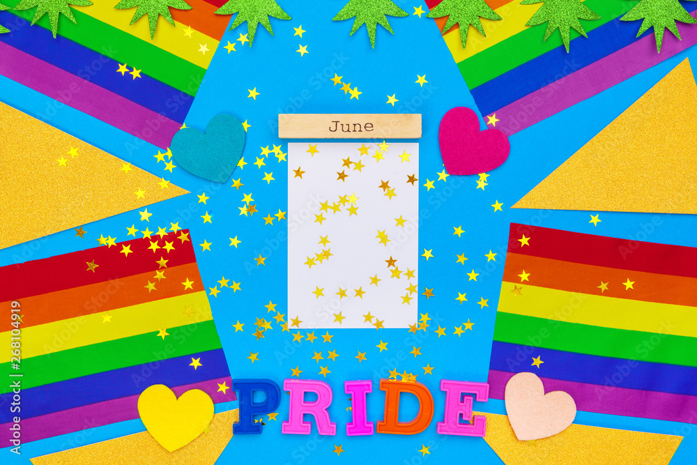 Naklejka premium Gay pride flag on wooden table