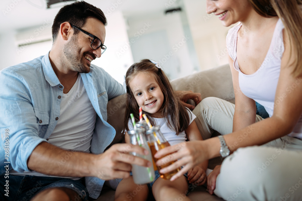 Happy family having fun time at home Happy family having fun time at home