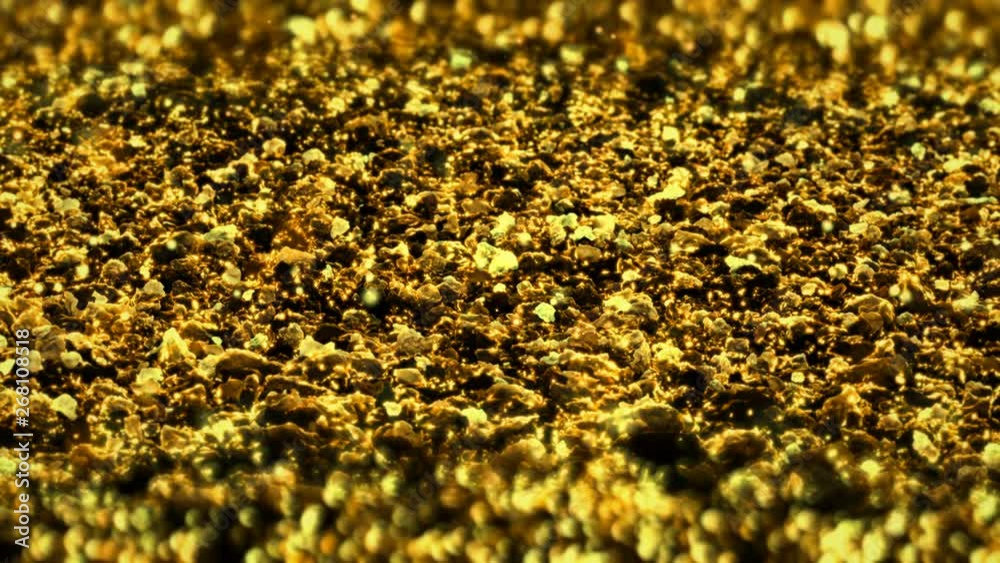 Golden Shiny glitter background abstract texture close up macro seamless loop particles Golden Shiny glitter background abstract texture close up macro seamless loop particles