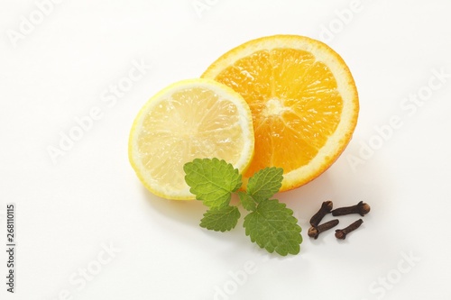 Lemon, orange, cloves, lemon balm