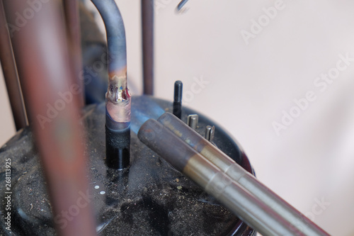 Obraz na plátně Soldering copper pipe