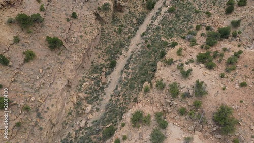 Aerial view looking down at dry wash in the Utah desert in Nine Mile Canyon. photo