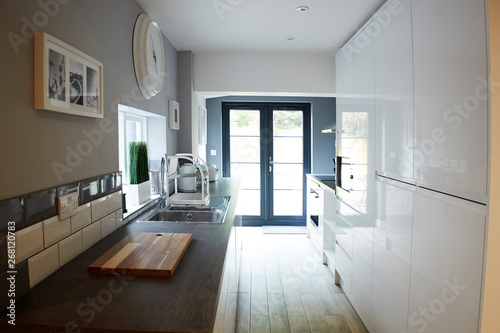 Kitchen in a refurbished house  looking towards back door