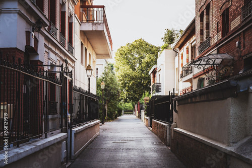 Cityscape of a typical street of the suburbs of Paris - Courbevoie, France photo